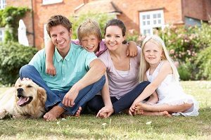 bigstock-family-sitting-in-garden-toget-13917122